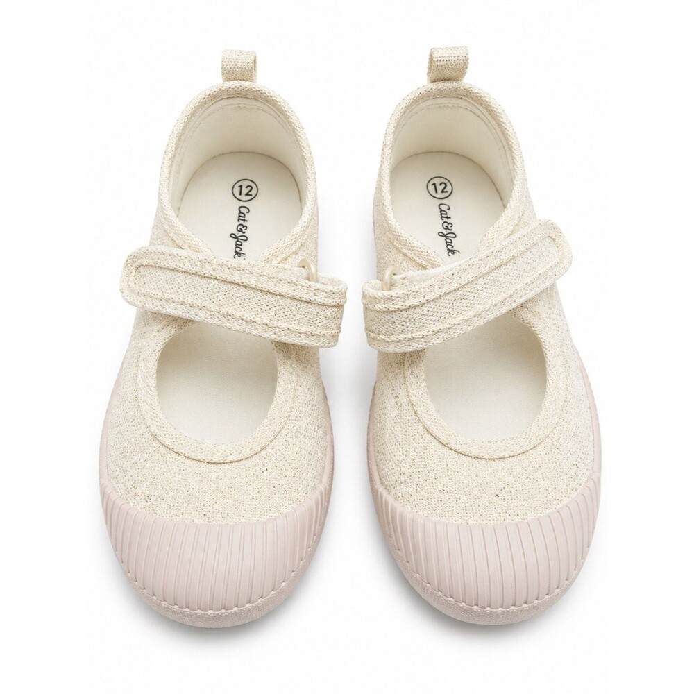 Cat & Jack Toddler Glitter Mary Jane Flats in an ivory/champagne shimmer finish.